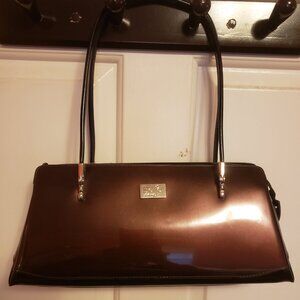 Beijo patent leather purse.